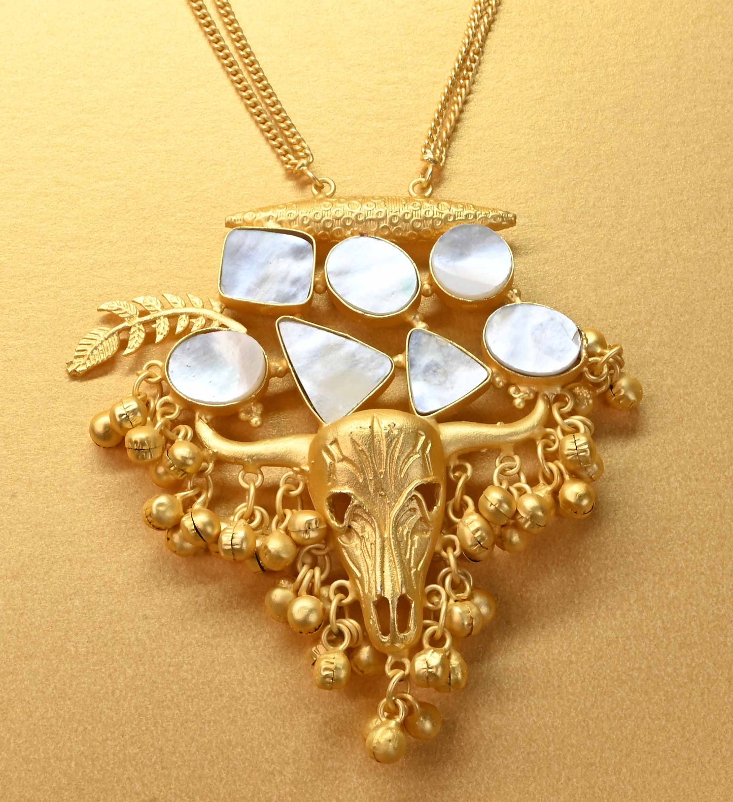 Diva Gold Toro Necklace with pure white mother of pearl Shell.