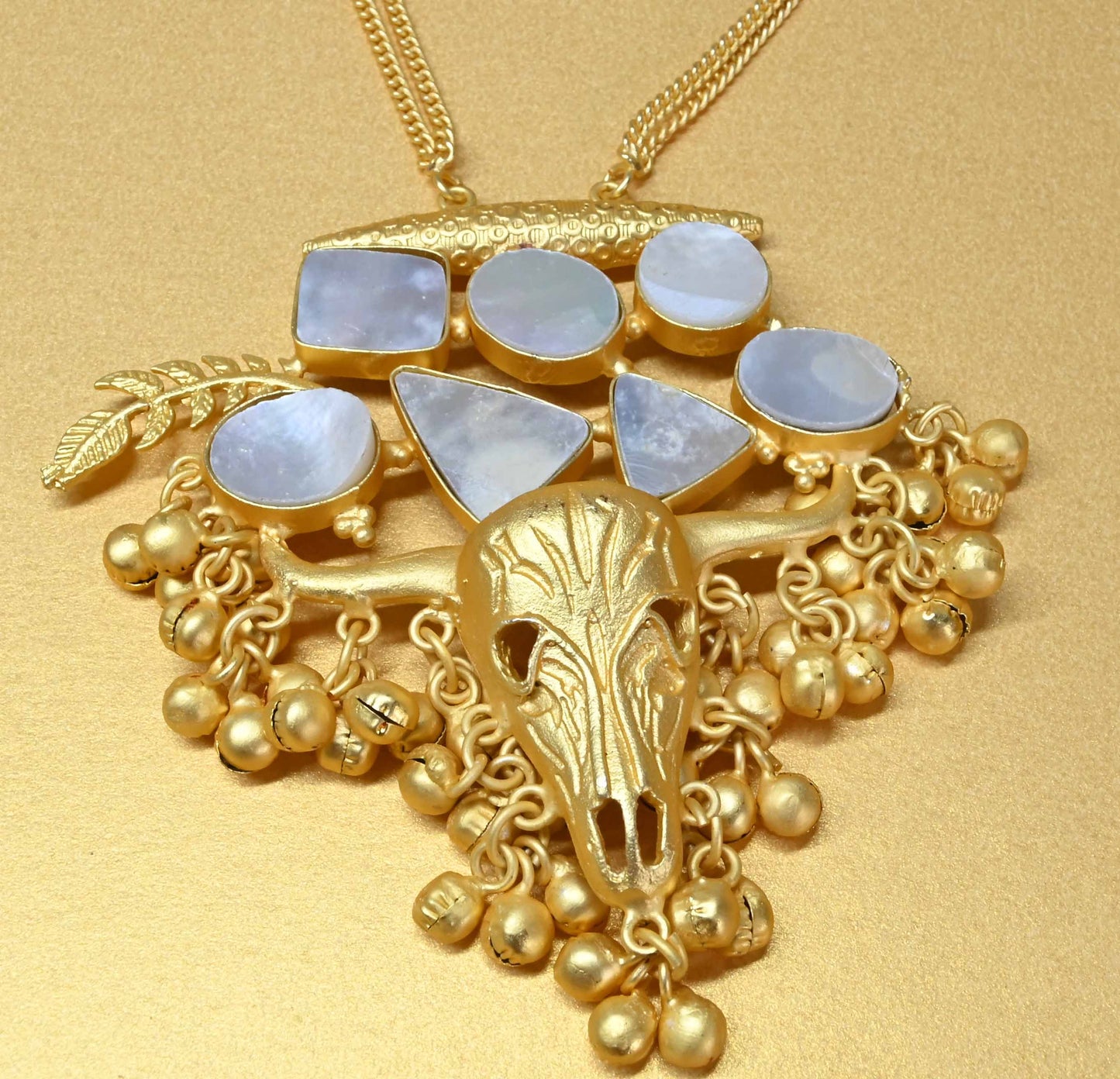 Diva Gold Toro Necklace with pure white mother of pearl Shell.